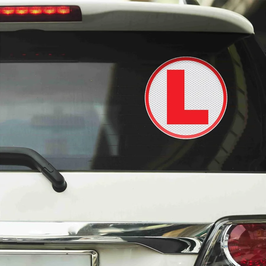 CVANU reflective L-board learner driver decal on a car rear window
